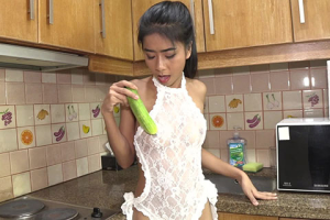 Sexy Thai Bangmaid Has Fun With A Cucumber